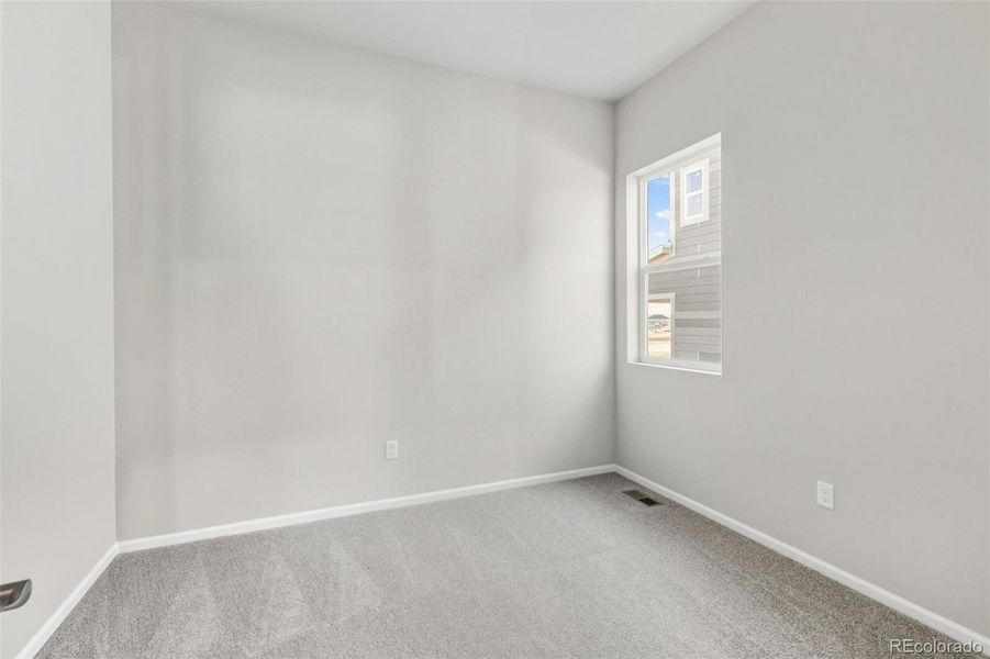 Spacious, unfurnished interior of a new home in Talon Pointe, Thornton (Image 24).