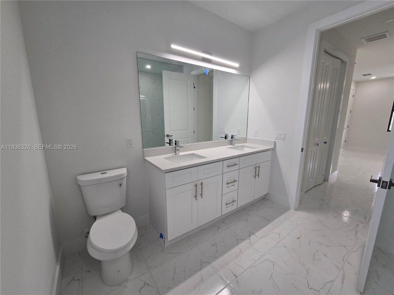 Furnished interior view inside a new home in , Lehigh Acres (Image 8).