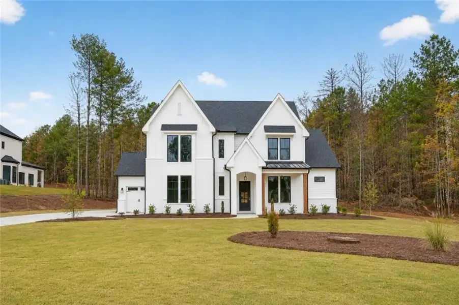 Front exterior of a new home in The Manors, Jefferson, GA, highlighting curb appeal (Image 25).