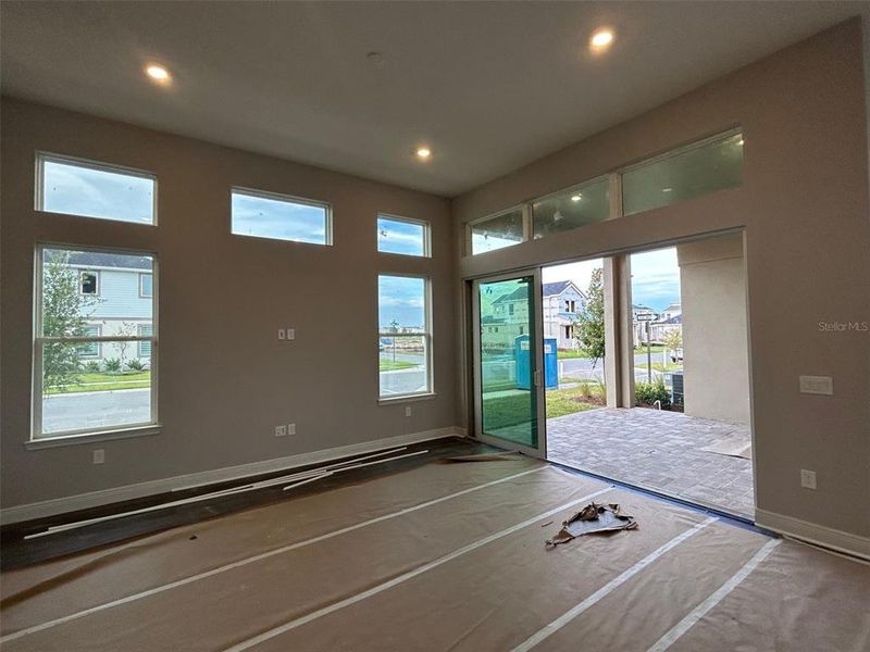 Spacious, unfurnished interior of a new home in Laureate Park, Orlando (Image 34).
