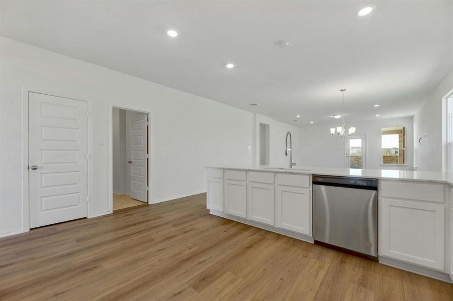 Seamless view from the kitchen to the living area, creating an open and inviting atmosphere for cooking and entertaining.