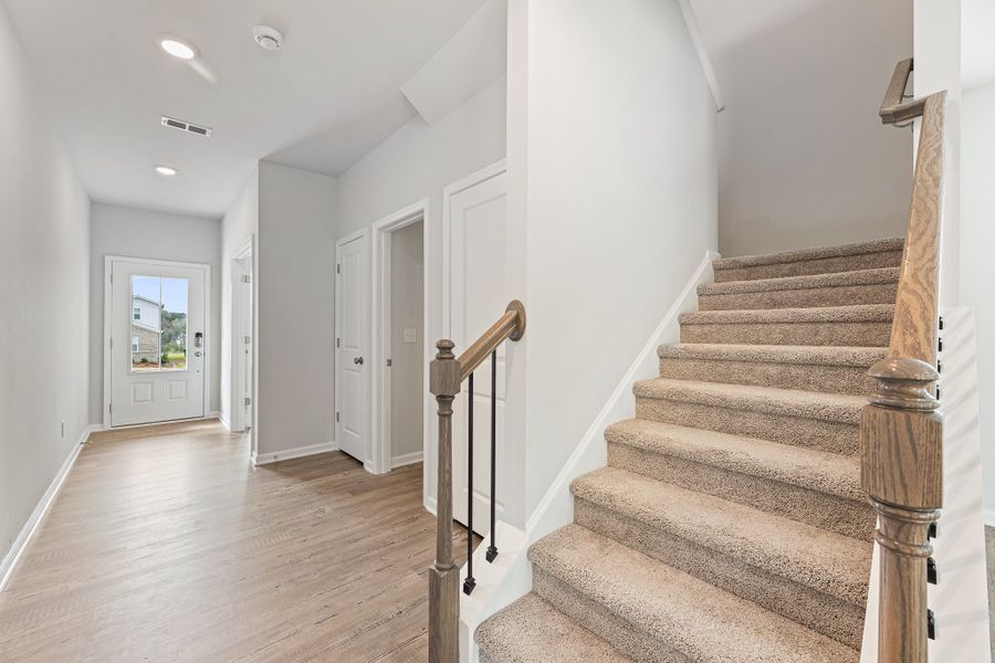 A staircase in a house. A staircase in a house.