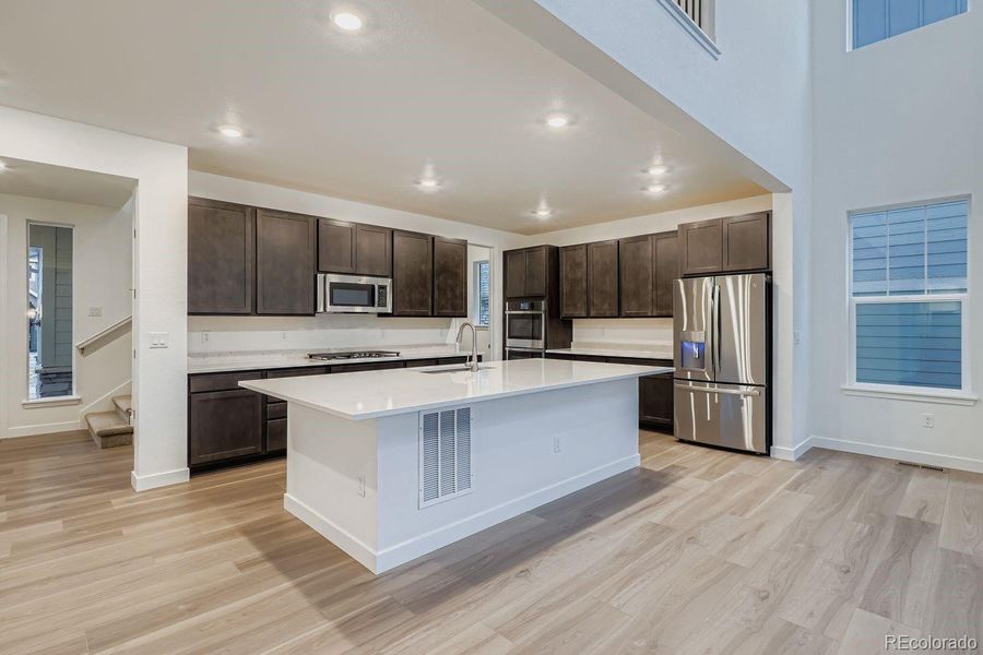 Furnished interior view inside a new home in Macanta: The Grand Collection, Castle Rock (Image 6).