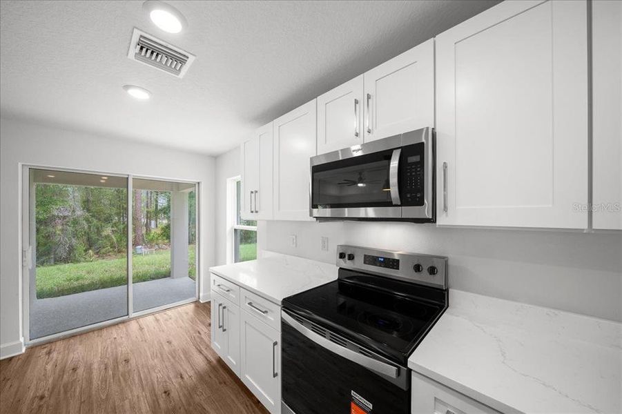 Furnished interior view inside a new home in , Weeki Wachee (Image 8).