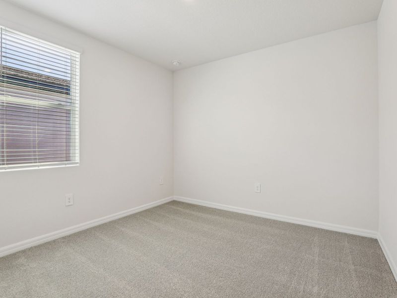 Spacious, unfurnished interior of a new home in Lake Deer Estates - Signature Series, Poinciana (Image 12).