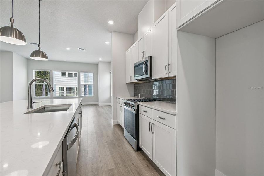 Furnished interior view inside a new home in Apex at Seminole Heights, Tampa (Image 7). Furnished interior view inside a new home in Apex at Seminole Heights, Tampa (Image 7).