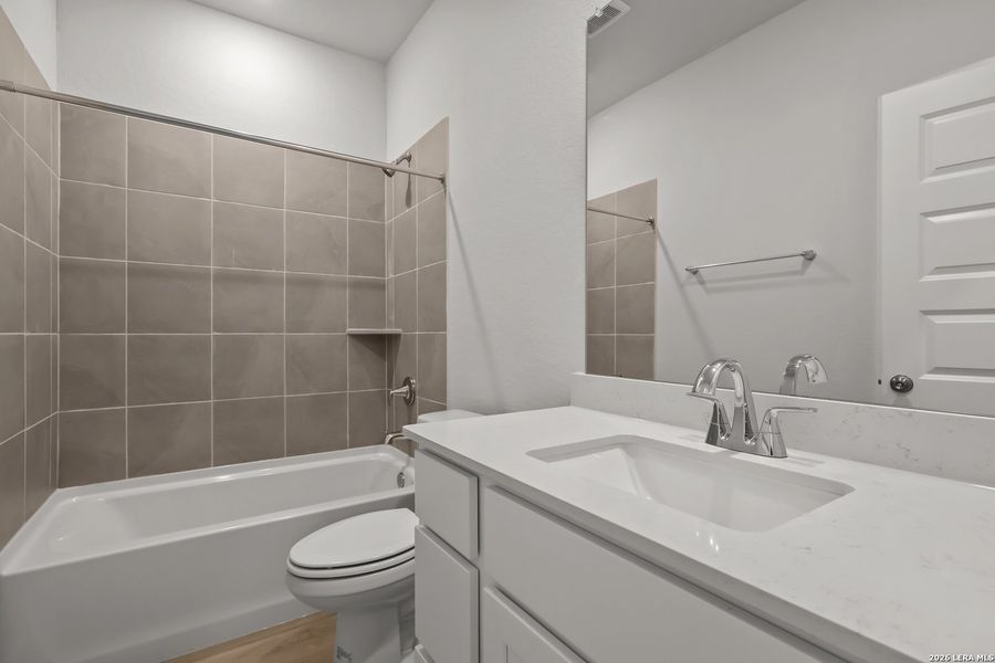 Furnished interior view inside a new home in Cinco Lakes, San Antonio (Image 10).