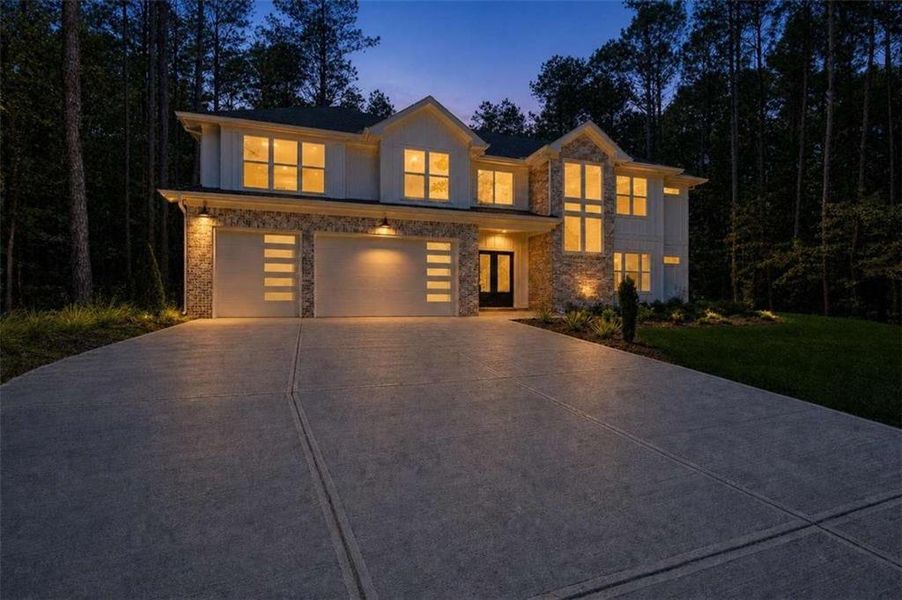 Front exterior of a new home in , Conyers, GA, highlighting curb appeal (Image 25). Front exterior of a new home in , Conyers, GA, highlighting curb appeal (Image 25).