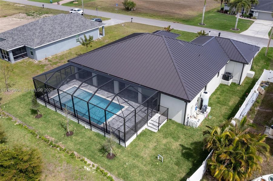 esigned for MODERN FLORIDA LIVING, this CONTEMPORARY LUXURY HOME features SCREENED SALTWATER POOL, perfect for year-round enjoyment! esigned for MODERN FLORIDA LIVING, this CONTEMPORARY LUXURY HOME features SCREENED SALTWATER POOL, perfect for year-round enjoyment!