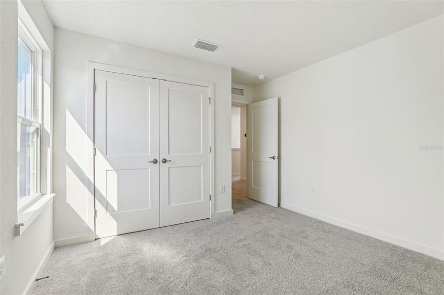 Spacious, unfurnished interior of a new home in Trinity Place, St. Cloud (Image 21). Spacious, unfurnished interior of a new home in Trinity Place, St. Cloud (Image 21).