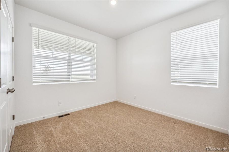 Spacious, unfurnished interior of a new home in Mountain View Ranch, Wellington (Image 15).