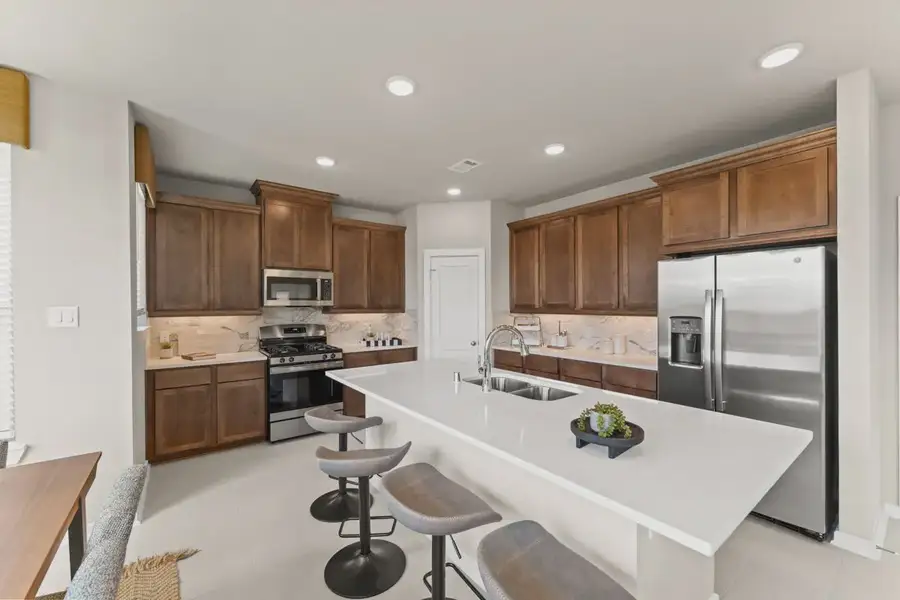 Representative furnished interior of a home built from the Capeside by Chesmar Homes in Meridiana Courtyard Collection, Manvel (Image 6).