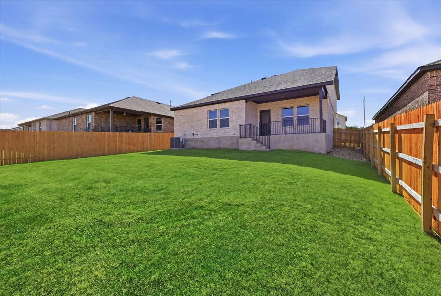 Exterior details and patio area of a home in Rosenbusch Ranch, Leander (Image 17).