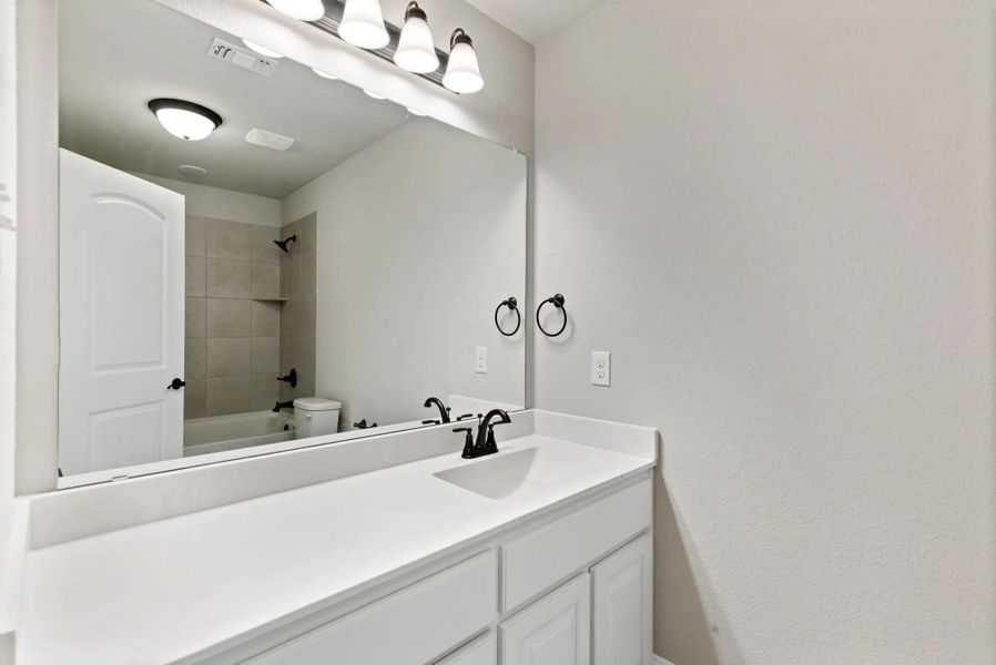 Bathroom 3 | Concept 3015 at Silo Mills - Signature Series in Joshua, TX by Landsea Homes