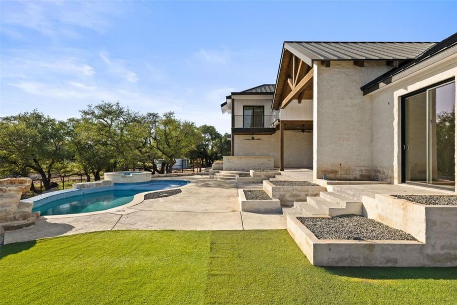 A private outdoor sanctuary awaits, complete with a refreshing pool and ample patio space for leisure. A private outdoor sanctuary awaits, complete with a refreshing pool and ample patio space for leisure.