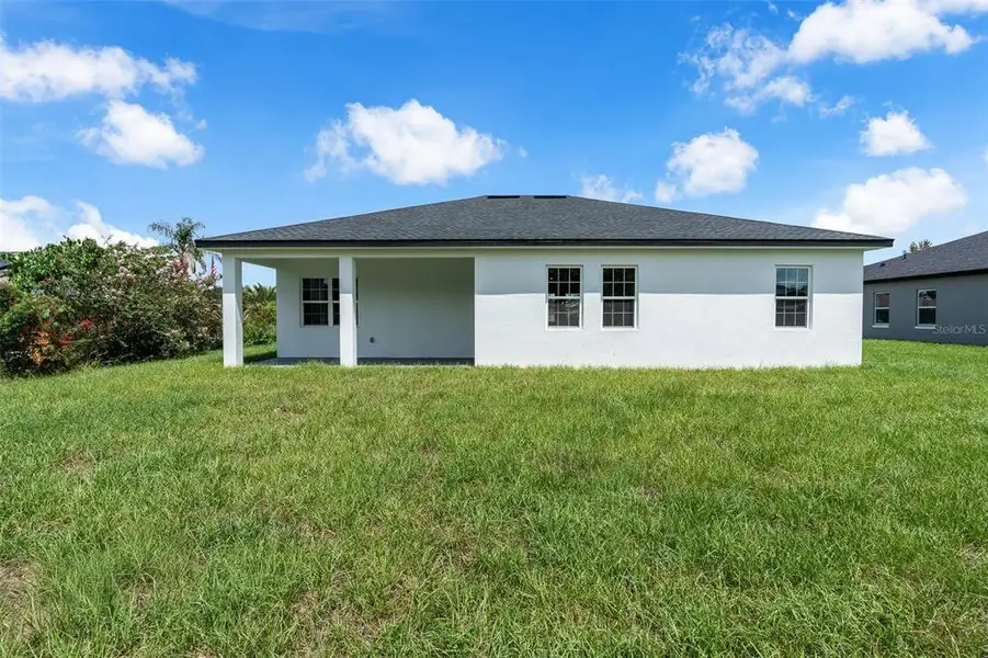 Exterior details and patio area of a home in , Ocala (Image 3).