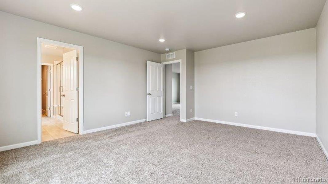 Spacious, unfurnished interior of a new home in Highlands Preserve, Mead (Image 14).