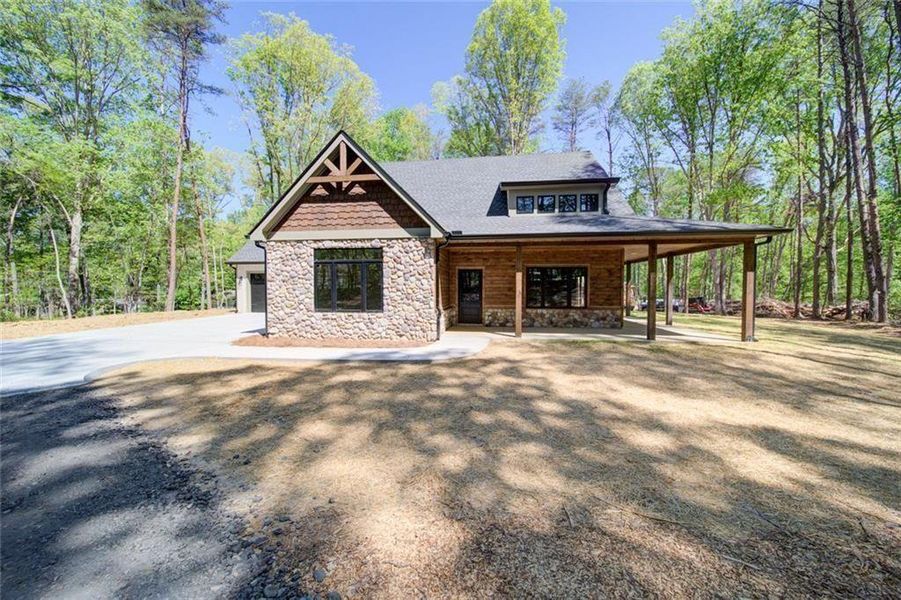 Front exterior of a new home in , Dawsonville, GA, highlighting curb appeal (Image 2). Front exterior of a new home in , Dawsonville, GA, highlighting curb appeal (Image 2).