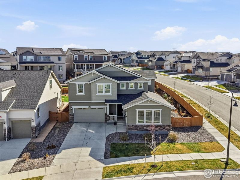 Front exterior of a new home in Sunset Village, Erie, CO, highlighting curb appeal (Image 2). Front exterior of a new home in Sunset Village, Erie, CO, highlighting curb appeal (Image 2).