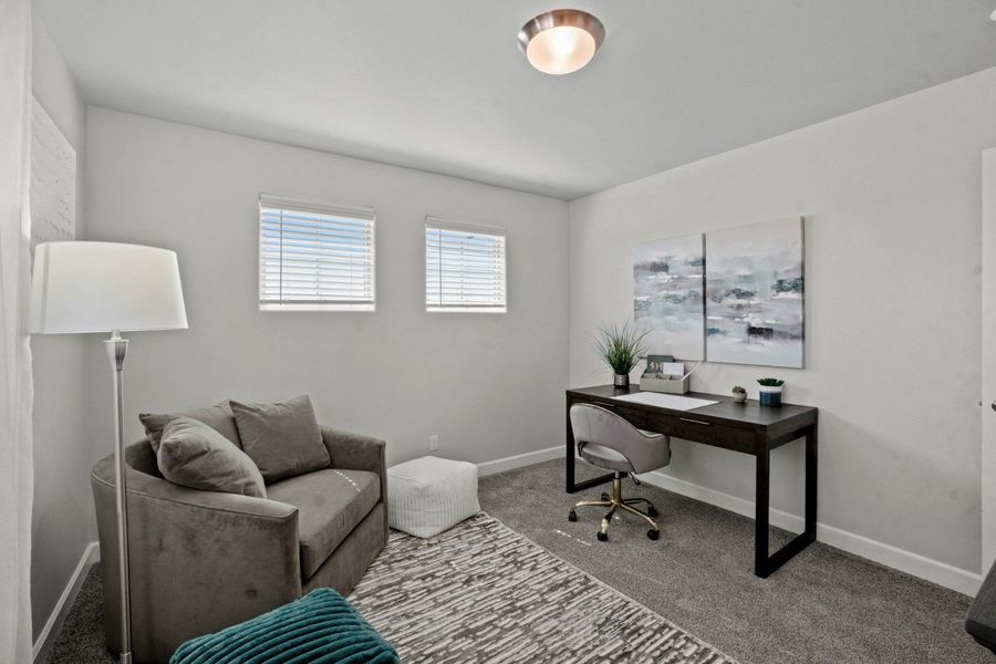 Representative furnished interior of a home built from the Capitan by Hakes Brothers in Hillside Park, El Paso (Image 8).