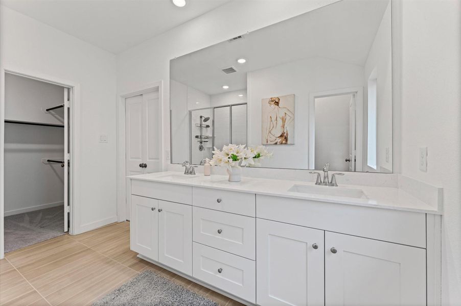 Master bathroom with another walk in closet, large shower Master bathroom with another walk in closet, large shower