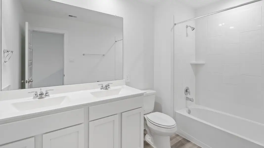 Furnished interior view inside a new home in Grand West, Houston (Image 4). Furnished interior view inside a new home in Grand West, Houston (Image 4).