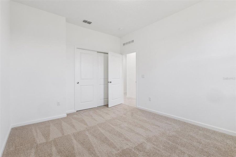 Spacious, unfurnished interior of a new home in Grand Isle, Grand Island (Image 21).