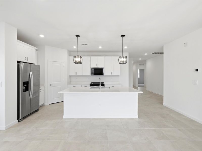 Furnished interior view inside a new home in Rancho Mirage Estate Series, Maricopa (Image 4).