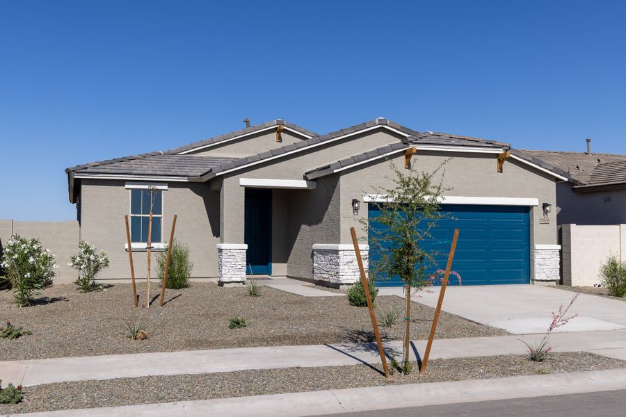 Front exterior of a new home in Rancho Santa Rosa, Maricopa, AZ, highlighting curb appeal (Image 2).