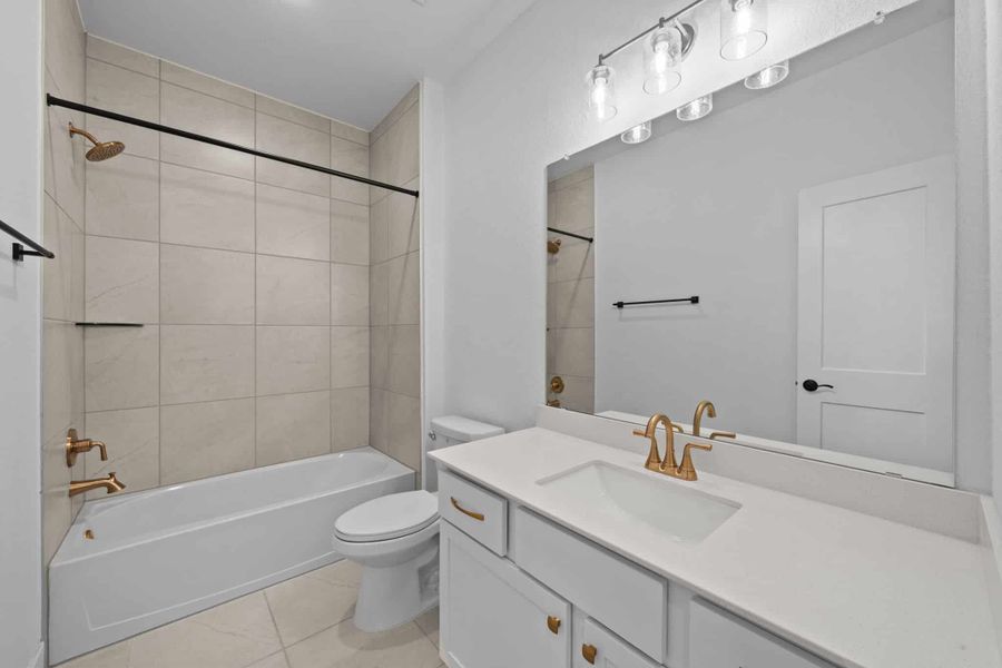 Furnished interior view inside a new home in The Woodlands Hills, Willis (Image 9).