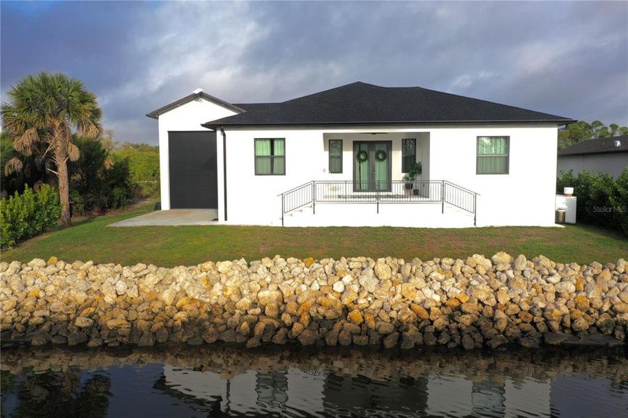 Front exterior of a new home in , Port Charlotte, FL, highlighting curb appeal (Image 30).