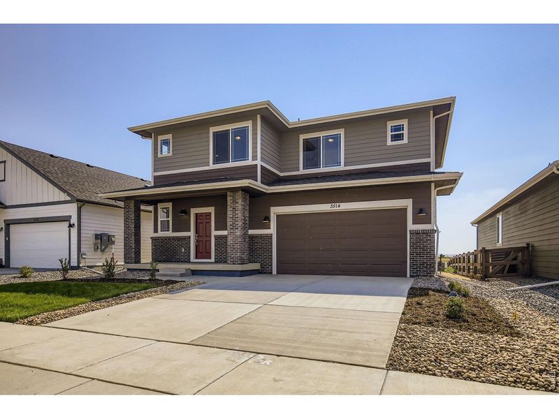 Front exterior of a new home in Country Club Reserve, Fort Collins, CO, highlighting curb appeal (Image 26).