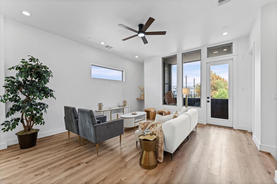 On to the second floor, you are greeted with an ample living room area