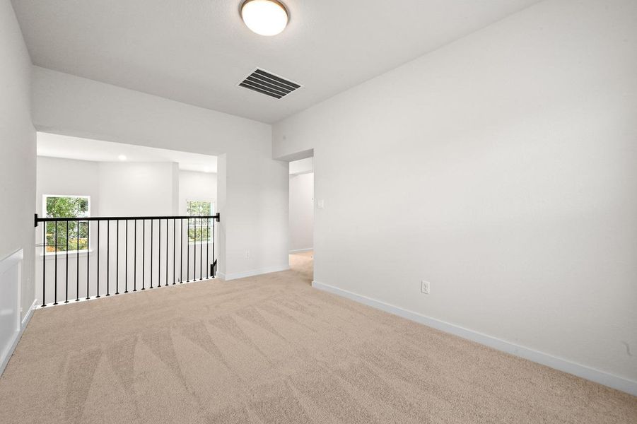 Spacious, unfurnished interior of a new home in 6 Creeks at Waterridge, Kyle (Image 18).