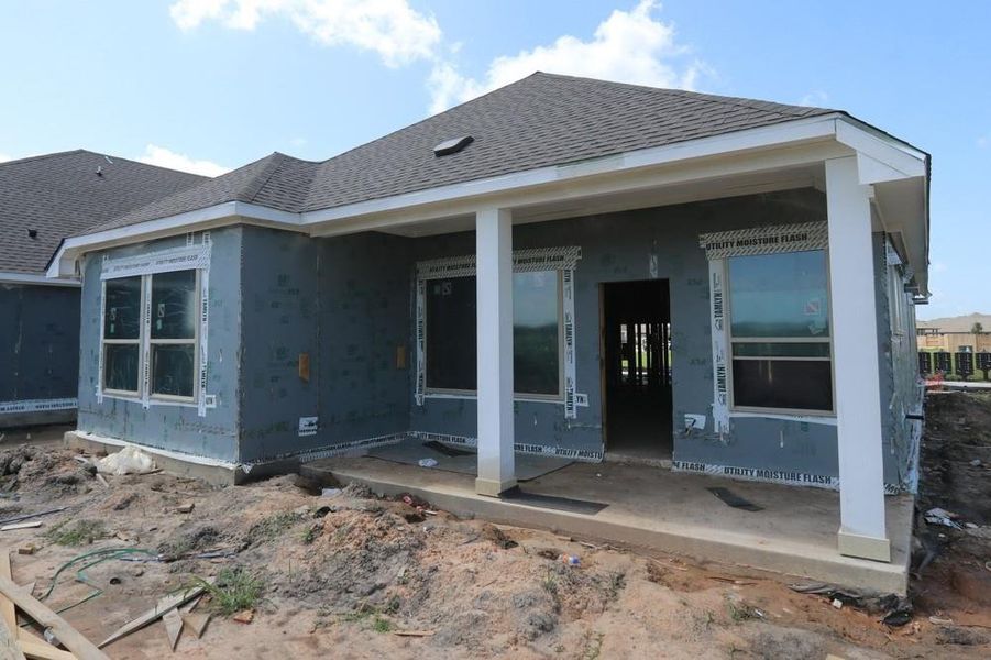 Front exterior of a new home in Meridiana 45' Homesites, Manvel, TX, highlighting curb appeal (Image 1). Front exterior of a new home in Meridiana 45' Homesites, Manvel, TX, highlighting curb appeal (Image 1).