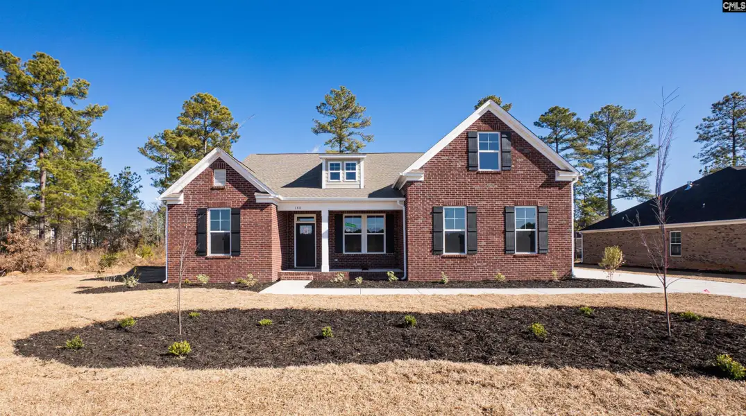 Front exterior of a new home in The Cove, Sumter, SC, highlighting curb appeal (Image 2). Front exterior of a new home in The Cove, Sumter, SC, highlighting curb appeal (Image 2).