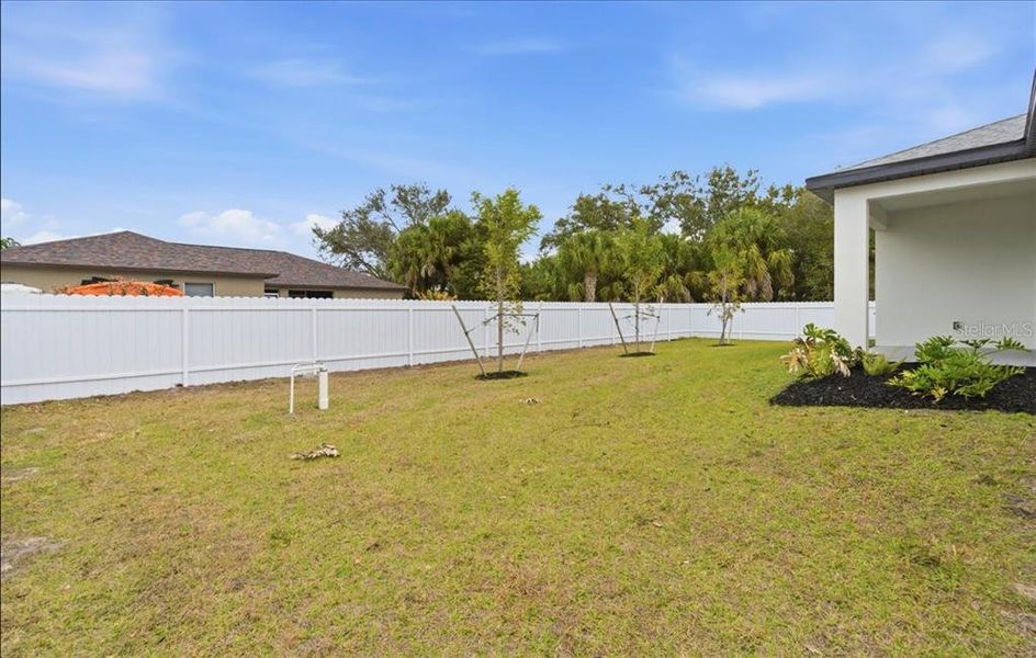 Exterior details and patio area of a home in , North Port (Image 37).