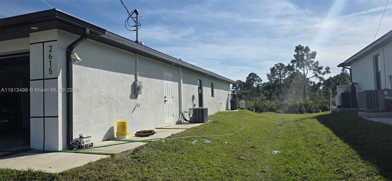 Exterior details and patio area of a home in , Lehigh Acres (Image 3).