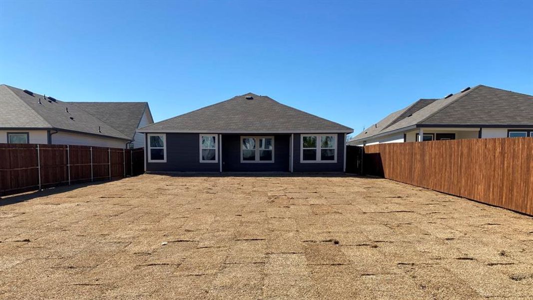 Exterior details and patio area of a home in Creeks at Burnett Trail, Canton (Image 2).
