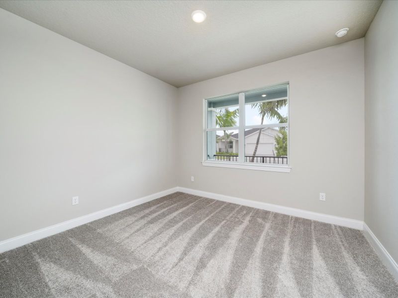 Bedroom in the Onyx floorplan at 6383 NW Sweetwood Drive in Brystol at Wylder