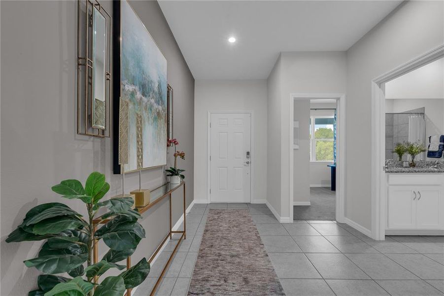 Furnished interior view inside a new home in Covered Bridge at Liberty Bluff, Haines City (Image 16). Furnished interior view inside a new home in Covered Bridge at Liberty Bluff, Haines City (Image 16).