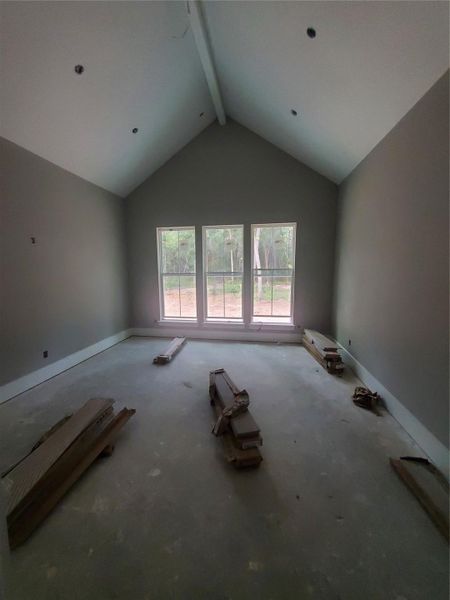 MASSIVE PRIMARY BED WITH 15' CEILINGS AND PREMIUM TILE WOOD PLANKS BEING INSTALLED