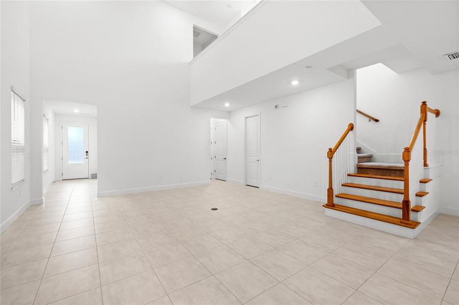 Spacious, unfurnished interior of a new home in Harvest At Ovation 50s, Winter Garden (Image 25).