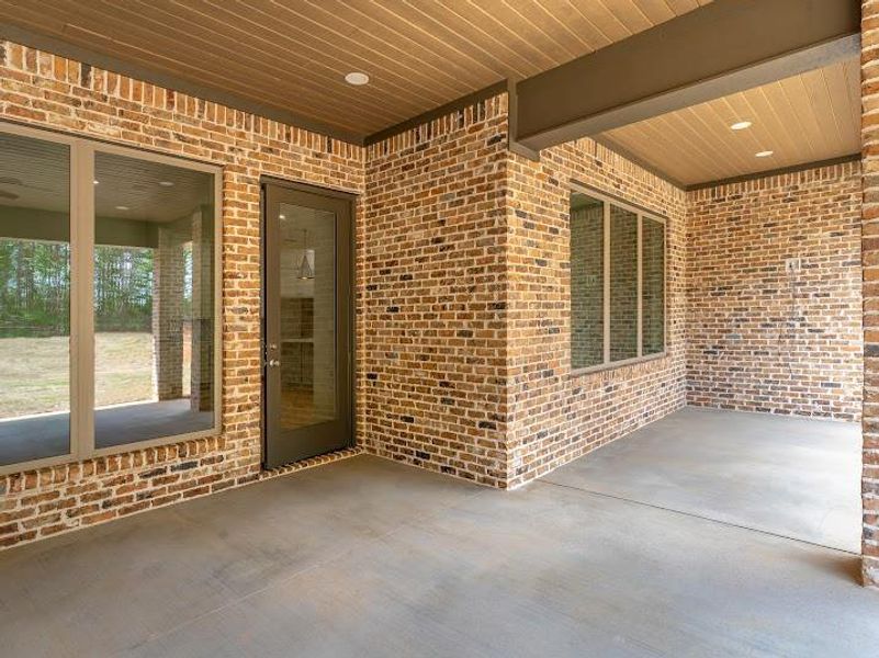 Exterior details and patio area of a home in , Longview (Image 4). Exterior details and patio area of a home in , Longview (Image 4).