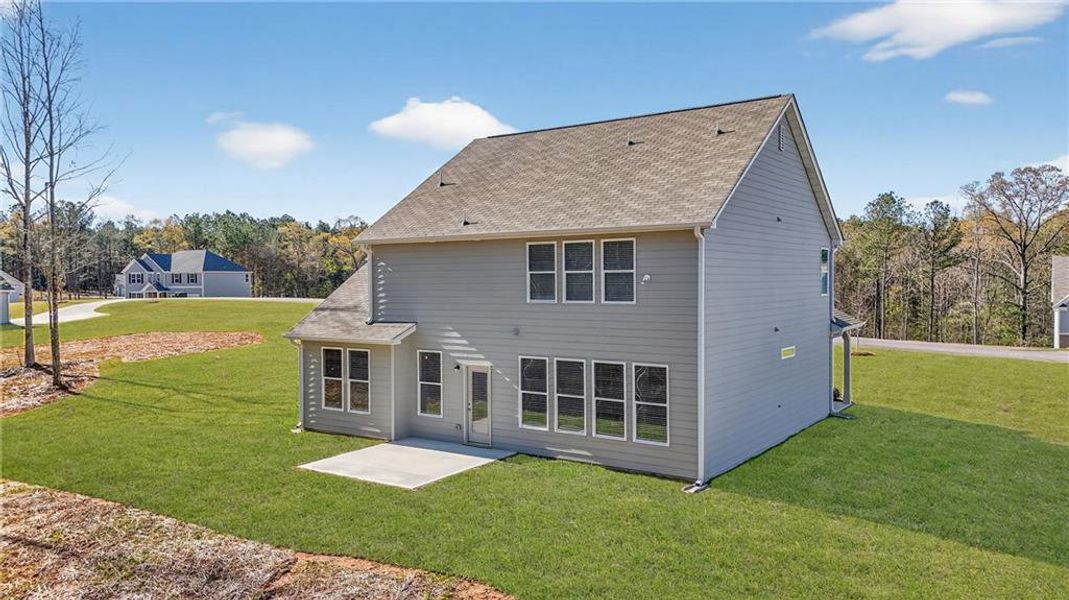 Exterior details and patio area of a home in Waters Edge, Mansfield (Image 3).