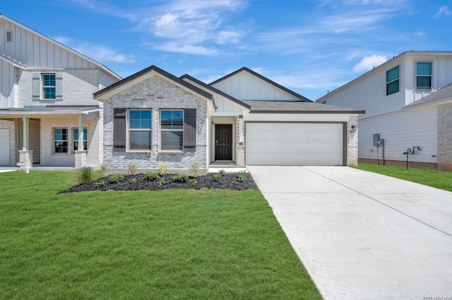 Front exterior of a new home in Verano Farms, Von Ormy, TX, highlighting curb appeal (Image 1). Front exterior of a new home in Verano Farms, Von Ormy, TX, highlighting curb appeal (Image 1).