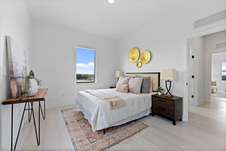 Furnished interior view inside a new home in On Villa Pass, Mascotte (Image 5). Furnished interior view inside a new home in On Villa Pass, Mascotte (Image 5).