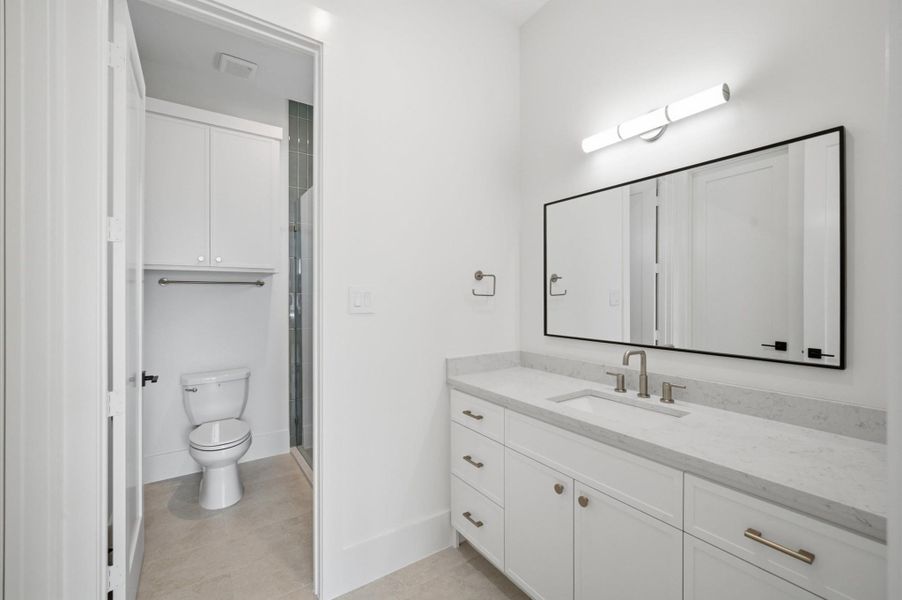 Bath 4 has a separate shower area for privacy.