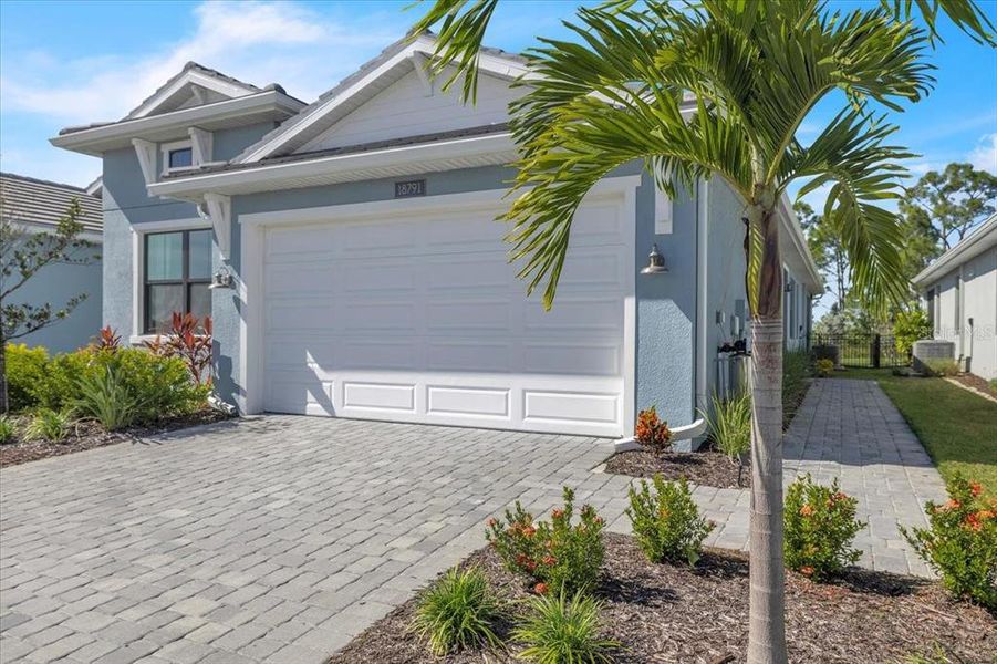 Front exterior of a new home in , Venice, FL, highlighting curb appeal (Image 25).