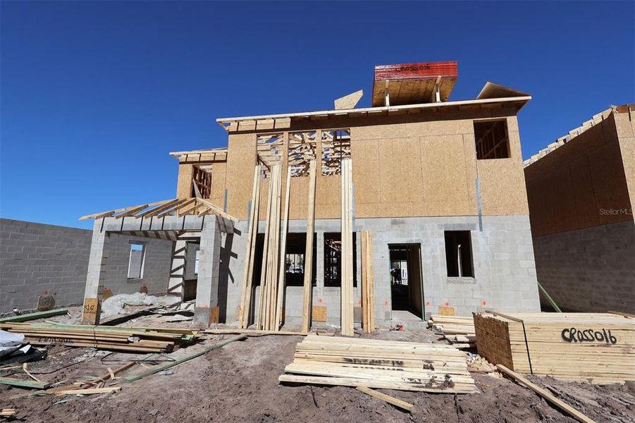 In-progress construction of a new home in Eden at Crossprairie, St. Cloud, FL (Image 14).
